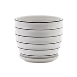 Black and white pot with attached saucer